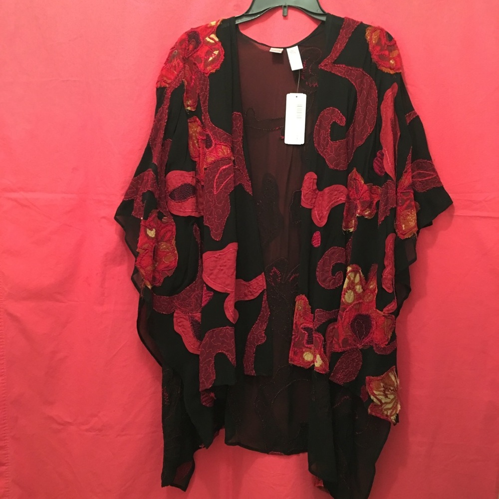 Chico’s lovely wrap in black, shades of red, gold